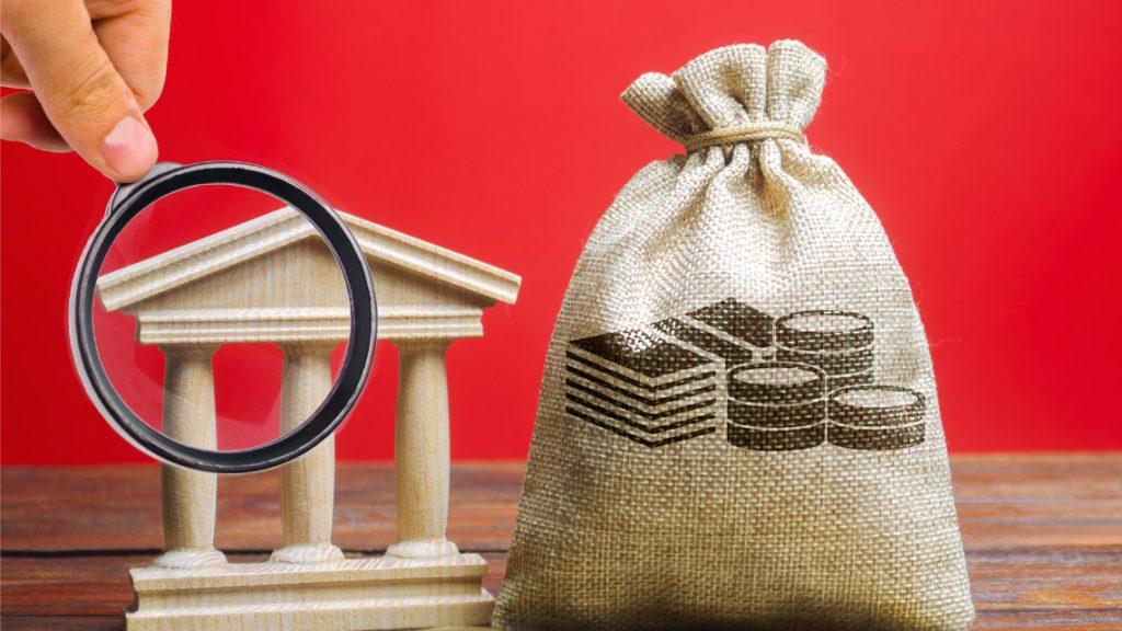 Image illustrating the capitol and a bag of money representing the state budget